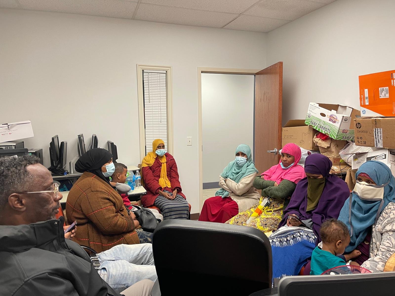 Community members gathered for an office discussion